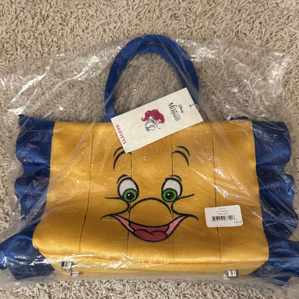 NWT: Harvey’s Disney Yellow and Blue Flounder Bag